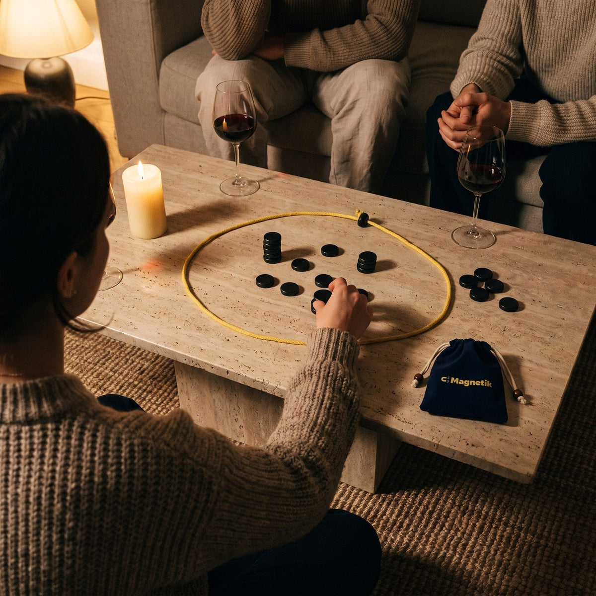 Friends playing around a coffee table